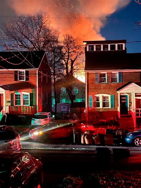 A huge explosion has destroyed at least one home in a suburb near Washington DC as police executed a search warrant. Officers were called to the home in Arlington, Virginia, on Monday after ...